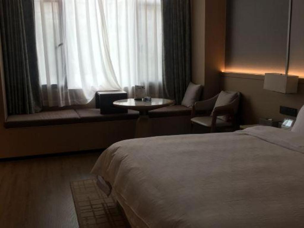Zhangjiagang Jiangnan Garden Hotel Exterior foto