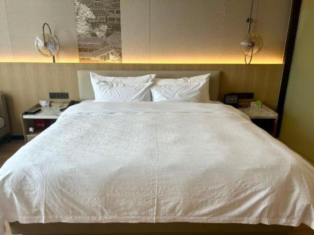 Zhangjiagang Jiangnan Garden Hotel Exterior foto